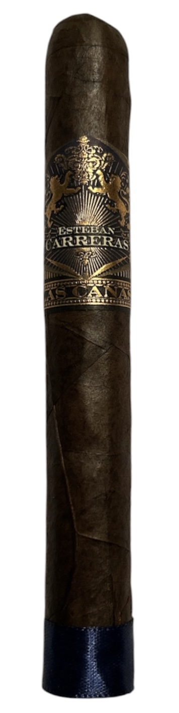 The Esteban Carreras Las Cañas standing upright, with a black and gold band and a blue ribbon at the foot